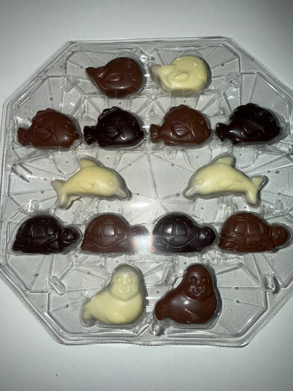 Chocolat belge noir, blanc, noir fourré praliné-  100 g (x7)